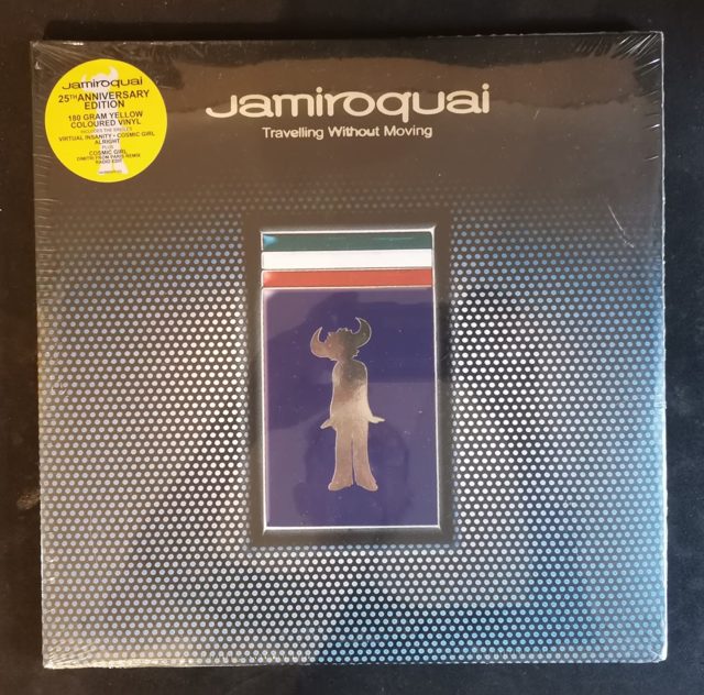 Actual copy: Jamiroquai — Travelling Without Moving (25th Anniversary Edition - 180 Gram Yellow Coloured Vinyl)
